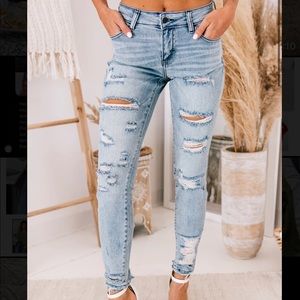 Bend The Rules Mid-Rise Distressed Jeans